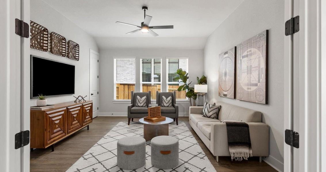 Representative furnished interior of a home built from the Mia by Chesmar Homes in Sunfield, Buda (Image 12).