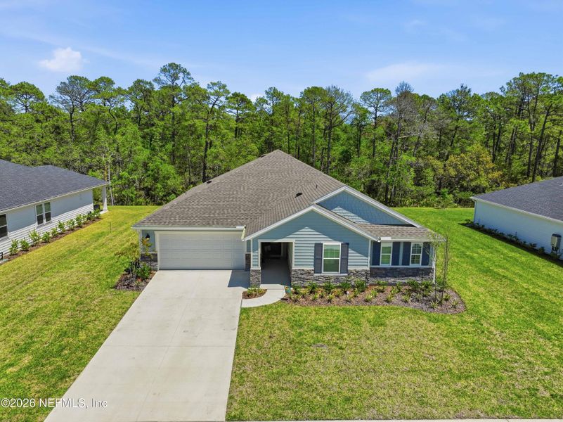 Front exterior of a new home in , St. Augustine, FL, highlighting curb appeal (Image 25).