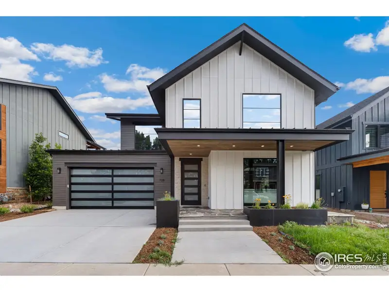 Front exterior of a new home in , Fort Collins, CO, highlighting curb appeal (Image 1).