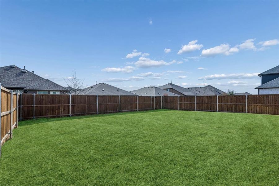 Exterior details and patio area of a home in AnaCapri, Anna (Image 3).