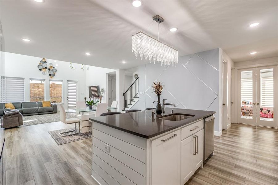 Open concept home with private office just off the kitchen with French doors. It opens to the dining area and large living room with views of the backyard patio and garden! Open concept home with private office just off the kitchen with French doors. It opens to the dining area and large living room with views of the backyard patio and garden!