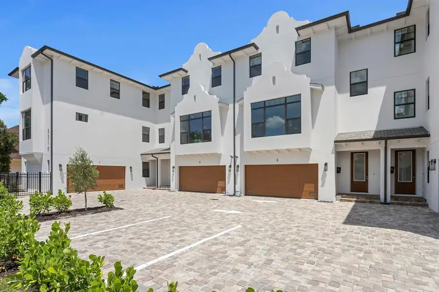 Front exterior of a new home in , Tampa, FL, highlighting curb appeal (Image 1). Front exterior of a new home in , Tampa, FL, highlighting curb appeal (Image 1).