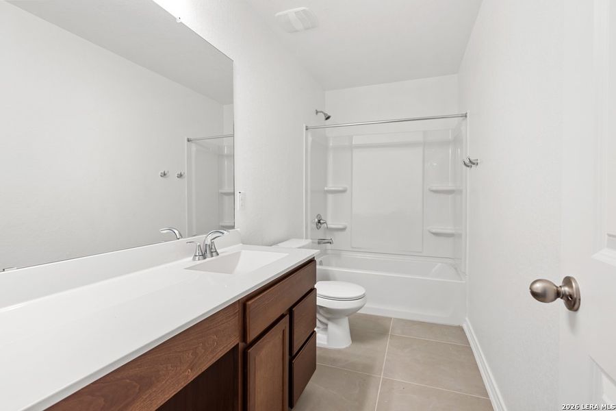 Furnished interior view inside a new home in Southton Cove, Elmendorf (Image 10).