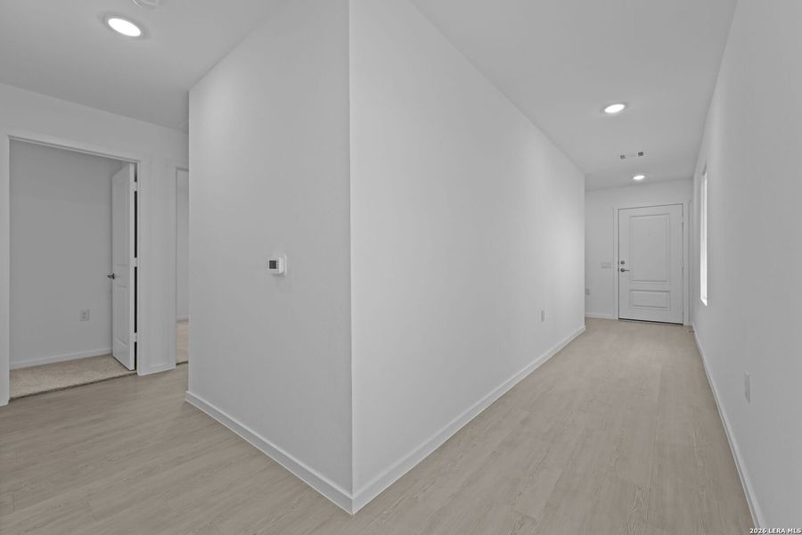 Spacious, unfurnished interior of a new home in Valle Sol, San Antonio (Image 24).