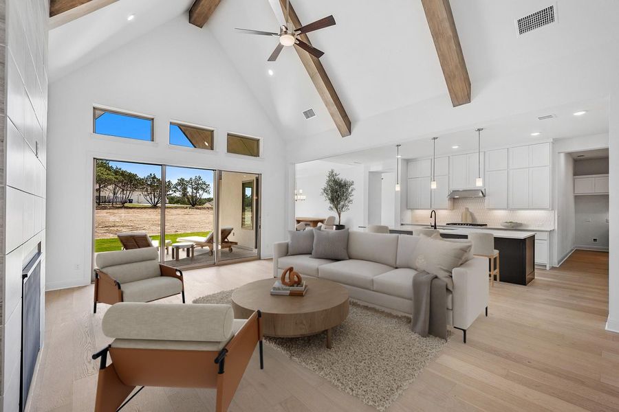 Virtually Staged Living area with high vaulted ceiling, recessed lighting, light wood-type flooring, a ceiling fan, and beamed ceiling