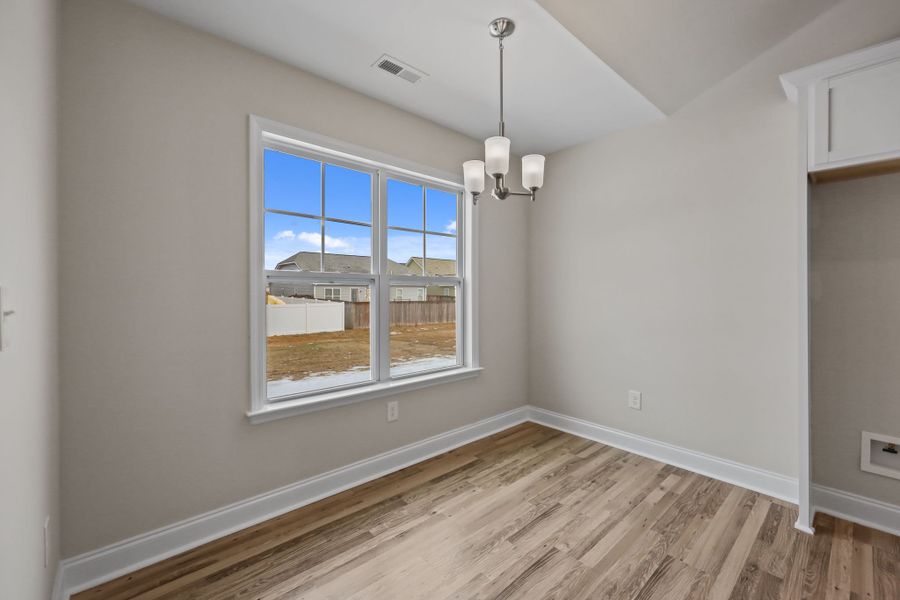 Representative unfurnished interior of a home built from the Hardy by Bill Clark Homes in Laurel Oaks, Greenville (Image 24).
