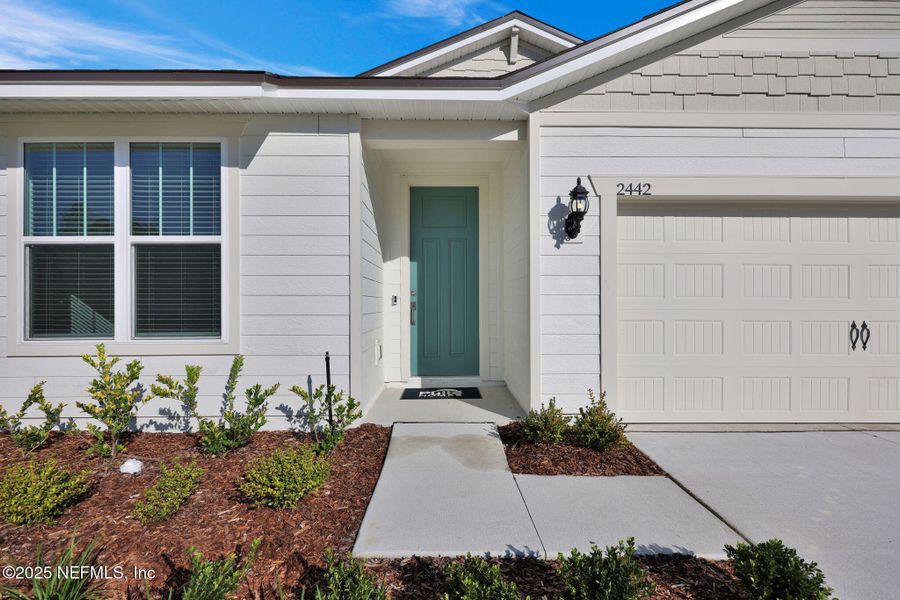 Exterior details and patio area of a home in Bradley Creek, Green Cove Springs (Image 29).