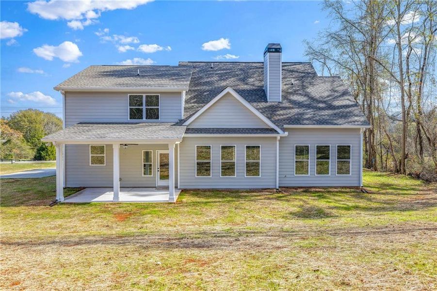 Front exterior of a new home in , Jefferson, GA, highlighting curb appeal (Image 25).
