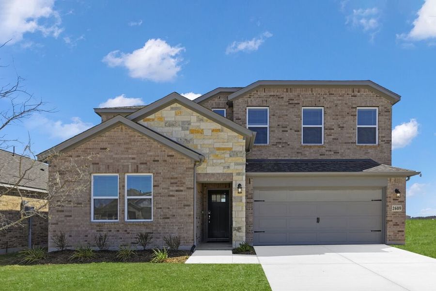 Front exterior of a new home in Parks at Foster Crossing, Anna, TX, highlighting curb appeal (Image 1). Front exterior of a new home in Parks at Foster Crossing, Anna, TX, highlighting curb appeal (Image 1).
