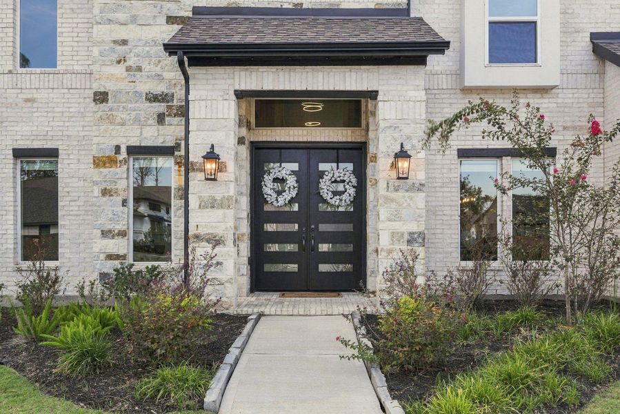 Exterior details and patio area of a home in The Highlands, Porter (Image 26).
