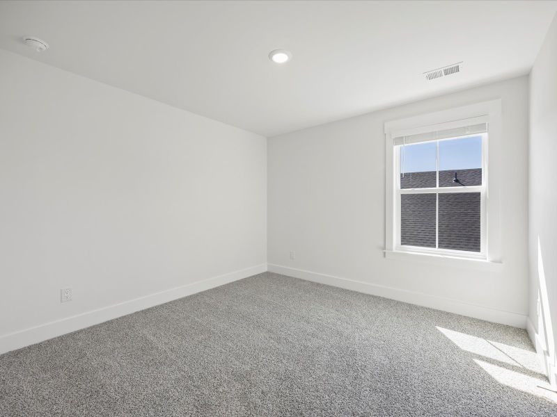 Spacious, unfurnished interior of a new home in The Coves at Lakes of Cane Bay, Summerville (Image 23). Spacious, unfurnished interior of a new home in The Coves at Lakes of Cane Bay, Summerville (Image 23).