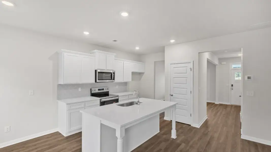 Representative furnished interior of a home built from the Ansley by D.R. Horton in Walden Ridge, Macon (Image 6).