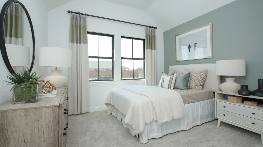 Representative furnished interior of a home built from the Juniper by Brightland Homes in Sunterra, Katy (Image 14).