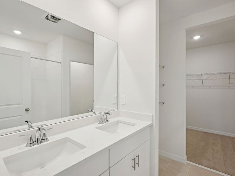 Furnished interior view inside a new home in The Grove at Stuart Crossing - Premier Series, Bartow (Image 6).