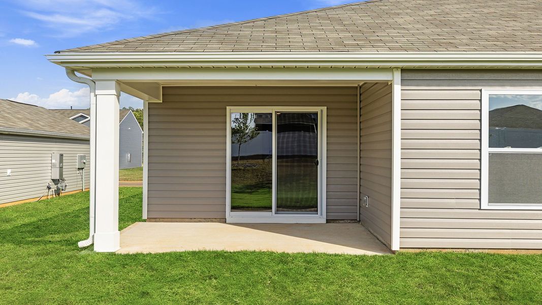 Exterior details and patio area of a home in Bentley Park, Greenwood (Image 18).