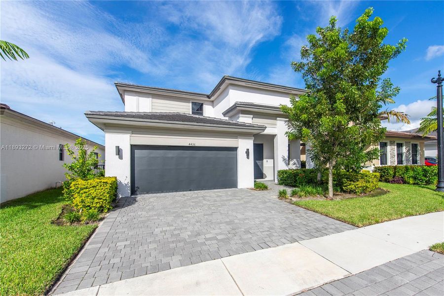 Front exterior of a new home in , Miramar, FL, highlighting curb appeal (Image 1).