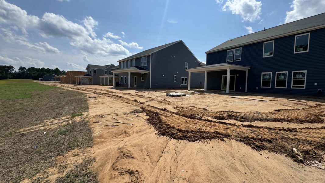Front exterior of a new home in Watson Hill, Summerville, SC, highlighting curb appeal (Image 2).