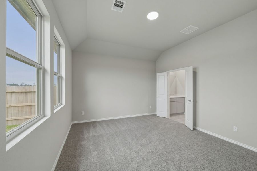 Primary Bedroom in the Cedar home plan by Trophy Signature Homes – REPRESENTATIVE PHOTO Primary Bedroom in the Cedar home plan by Trophy Signature Homes – REPRESENTATIVE PHOTO