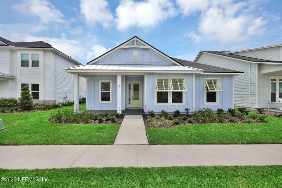 Front exterior of a new home in Seabrook Village at Seabrook, Nocatee, FL, highlighting curb appeal (Image 2).
