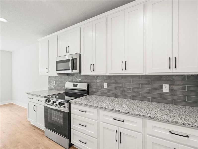 Furnished interior view inside a new home in , Weeki Wachee (Image 6).