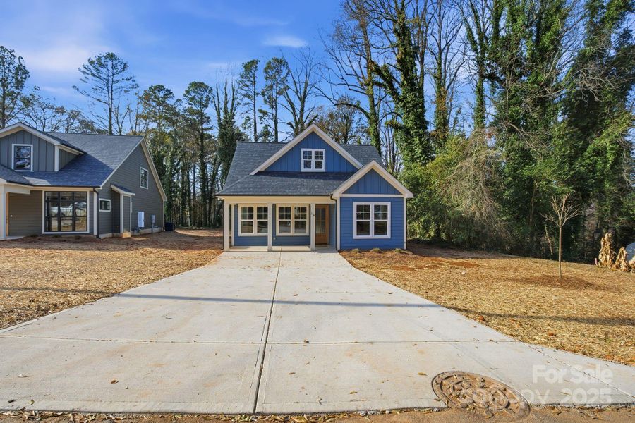 Front exterior of a new home in , Belmont, NC, highlighting curb appeal (Image 18).