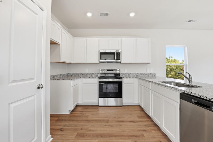 Furnished interior view inside a new home in Central Creek, Goose Creek (Image 6).