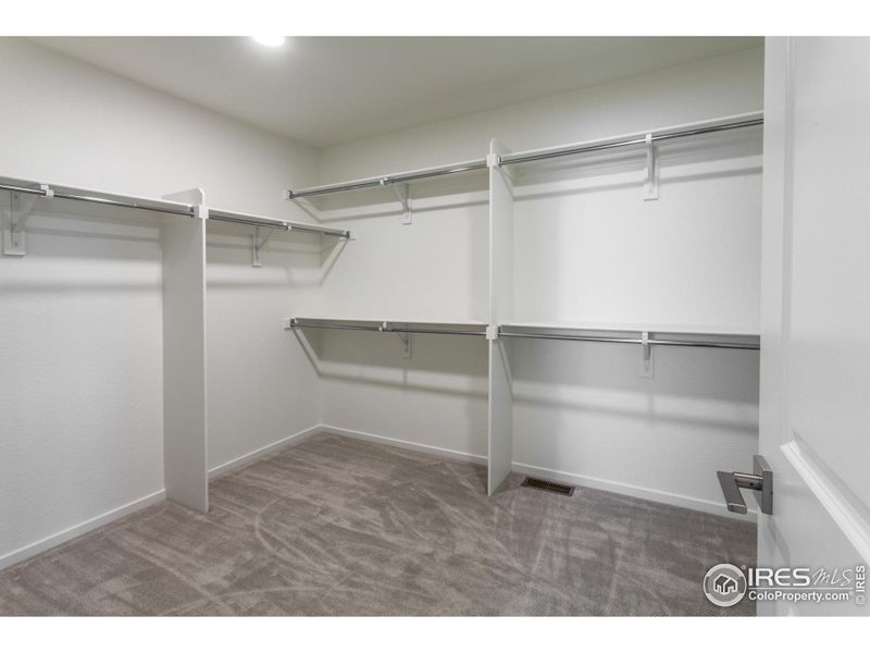 MASTER BEDROOM WALK IN CLOSET