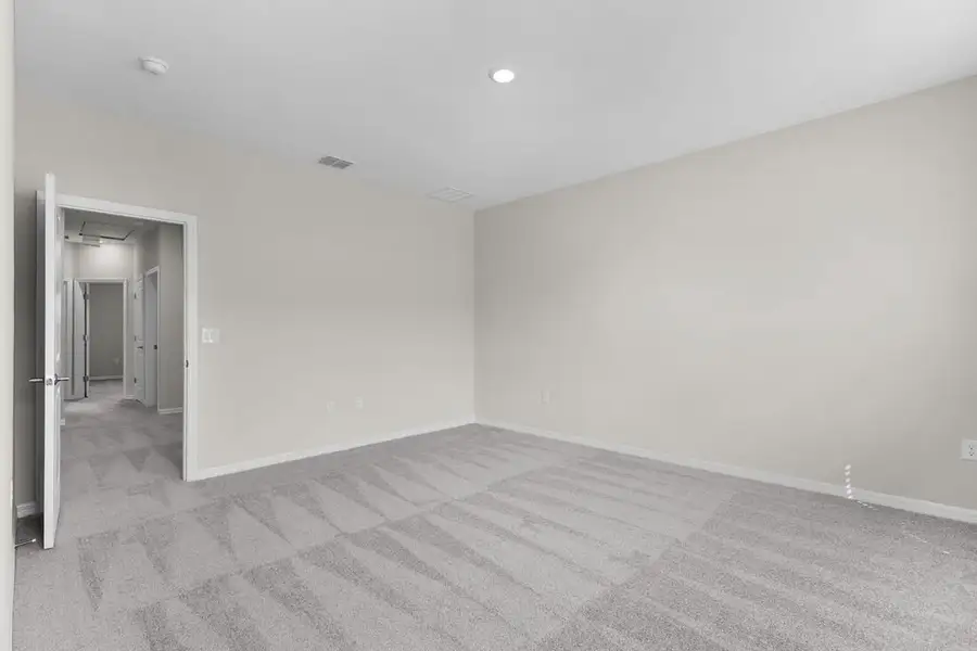 Spacious, unfurnished interior of a new home in Cherry Elm at SilverLeaf, St. Augustine (Image 13).