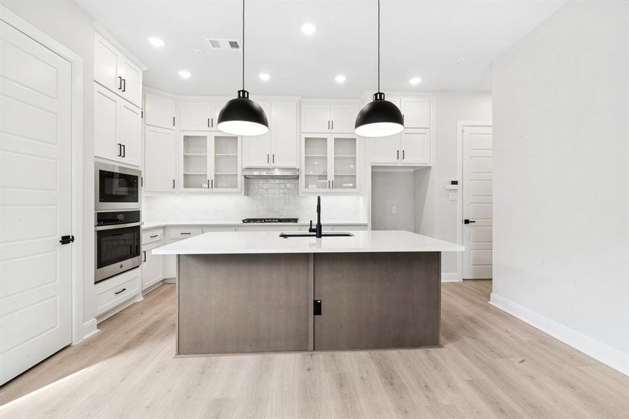 Furnished interior view inside a new home in Hillside at Las Colinas, Irving (Image 8). Furnished interior view inside a new home in Hillside at Las Colinas, Irving (Image 8).