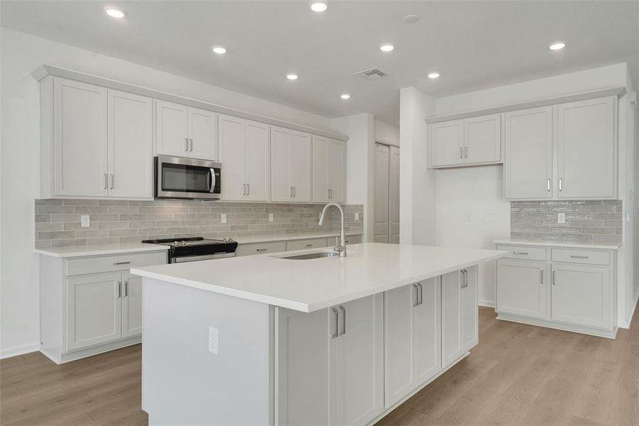 Furnished interior view inside a new home in Green Key Village, Lady Lake (Image 7).