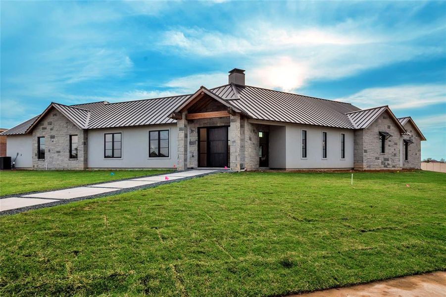Front exterior of a new home in Montclair, Prosper, TX, highlighting curb appeal (Image 18).
