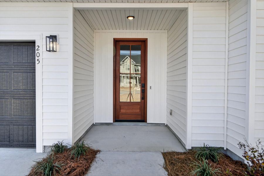 Exterior details and patio area of a home in , Summerville (Image 25).