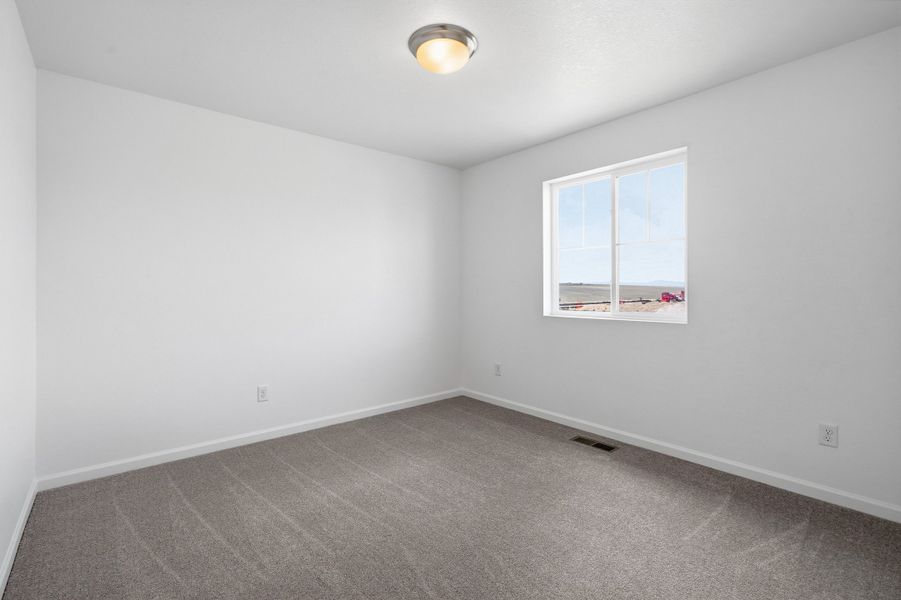 Representative unfurnished interior of a home built from the Eagle II by Taylor Morrison in The Town Collection at Independence, Elizabeth (Image 28).