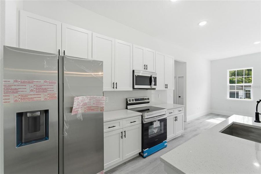 Furnished interior view inside a new home in , Dunnellon (Image 11).