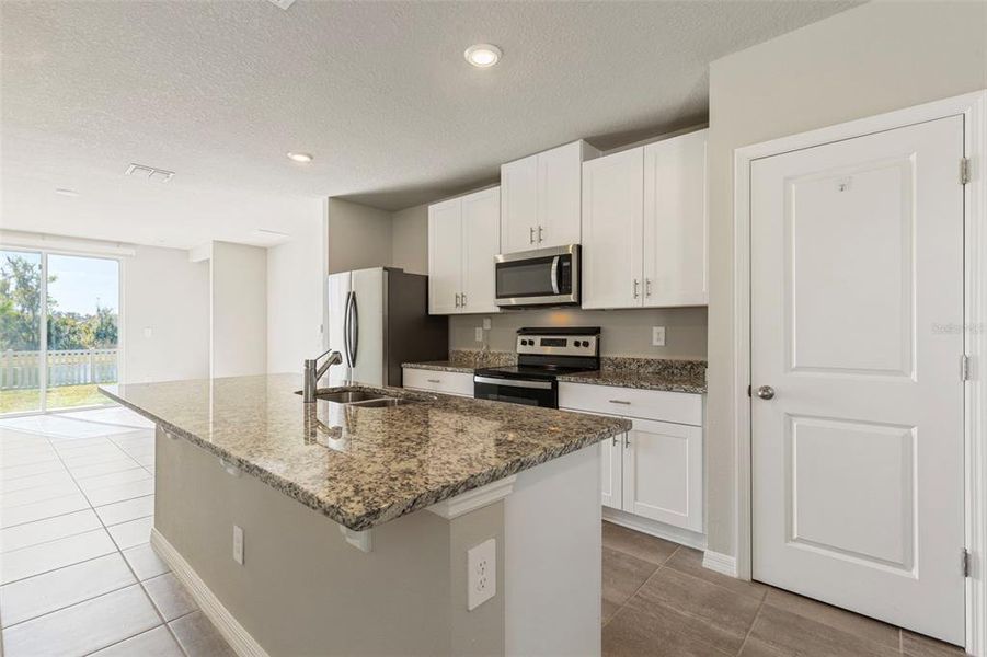 Furnished interior view inside a new home in Park East, Plant City (Image 8).