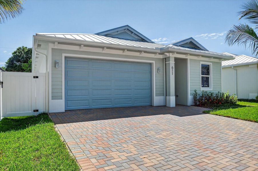 Front exterior of a new home in , Jupiter, FL, highlighting curb appeal (Image 25).