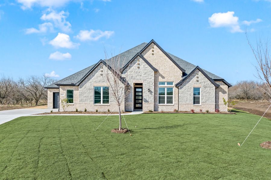 Representative exterior photo of a completed home built from the Carson by Our Country Homes in Highland Oaks, Boyd, TX (Image 8).