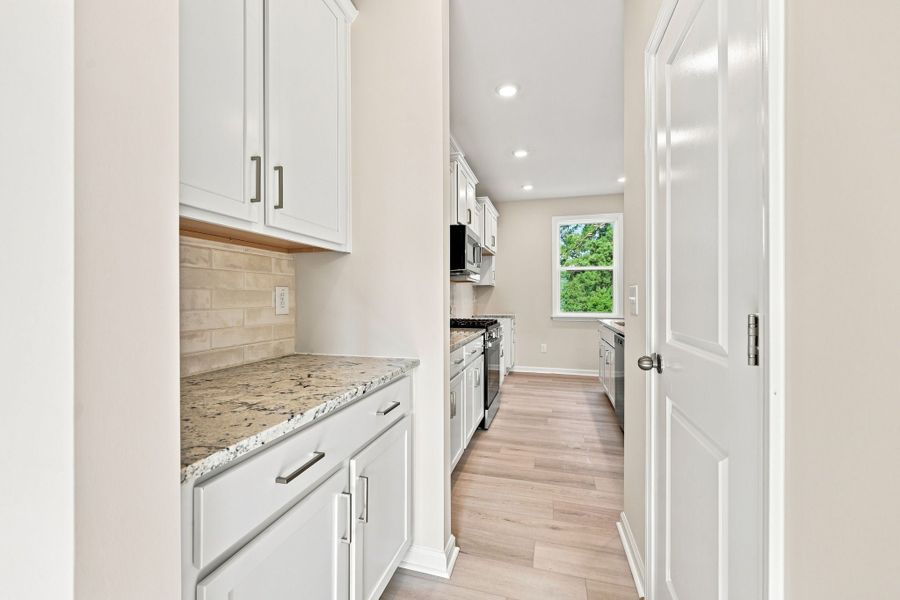 Furnished interior view inside a new home in Neill's Pointe, Angier (Image 10).