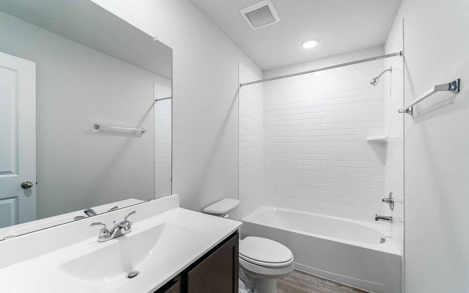 Furnished interior view inside a new home in Brooklands, Hutto (Image 4).