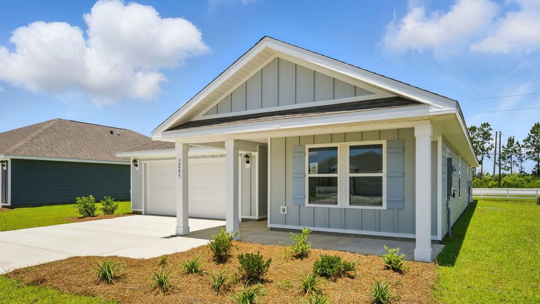 Front exterior of a new home in Hodges Bayou Plantation, Panama City, FL, highlighting curb appeal (Image 2). Front exterior of a new home in Hodges Bayou Plantation, Panama City, FL, highlighting curb appeal (Image 2).
