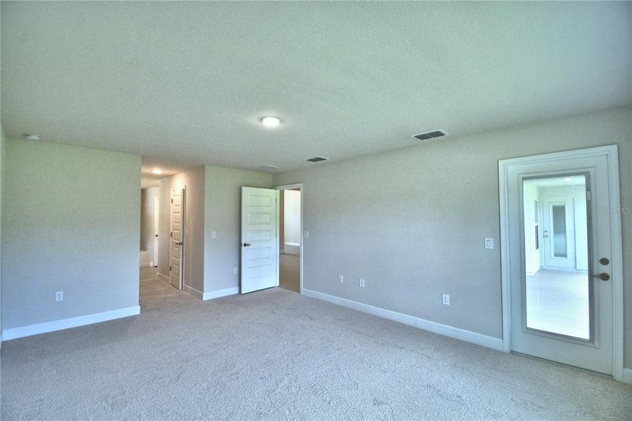 Spacious, unfurnished interior of a new home in Cadence Crossing, Auburndale (Image 40).