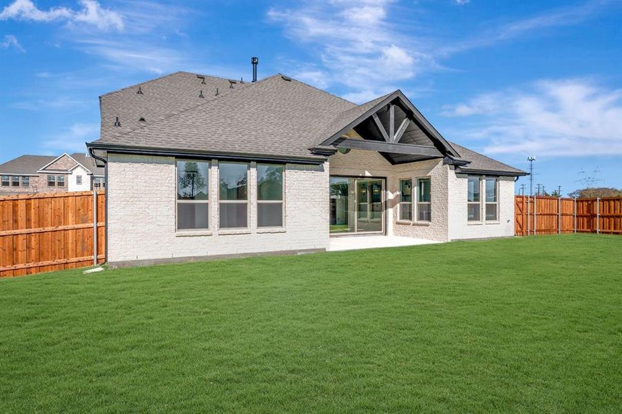 Exterior details and patio area of a home in Kreymer at the Park, Wylie (Image 2).