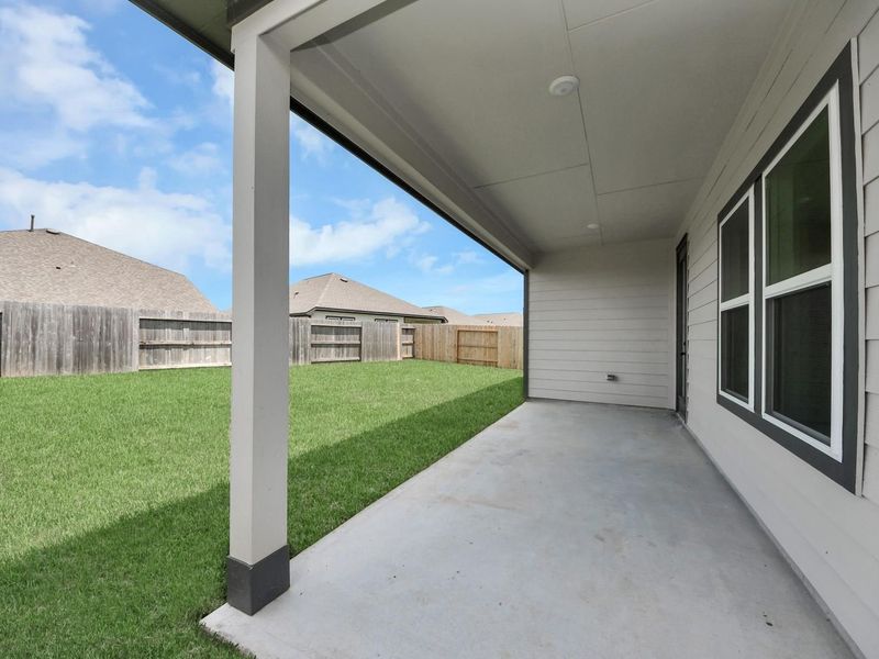 Exterior details and patio area of a home in Sunterra, Katy (Image 3). Exterior details and patio area of a home in Sunterra, Katy (Image 3).