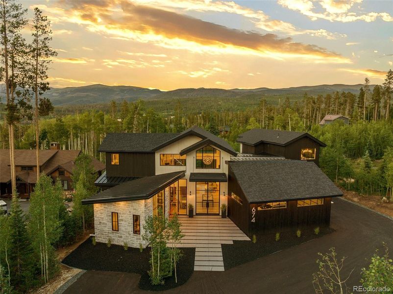 Front exterior of a new home in , Winter Park, CO, highlighting curb appeal (Image 1).