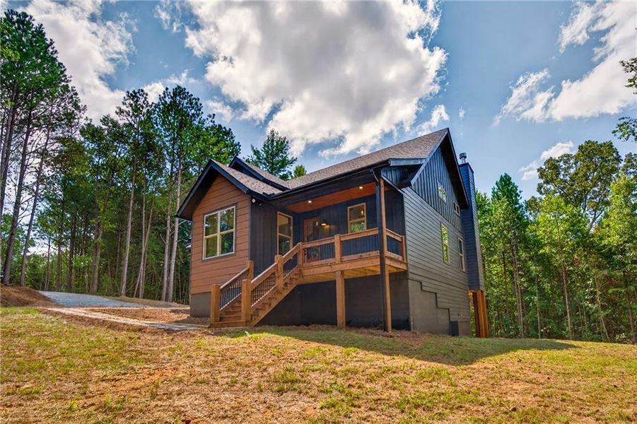 Exterior details and patio area of a home in , Ellijay (Image 35).
