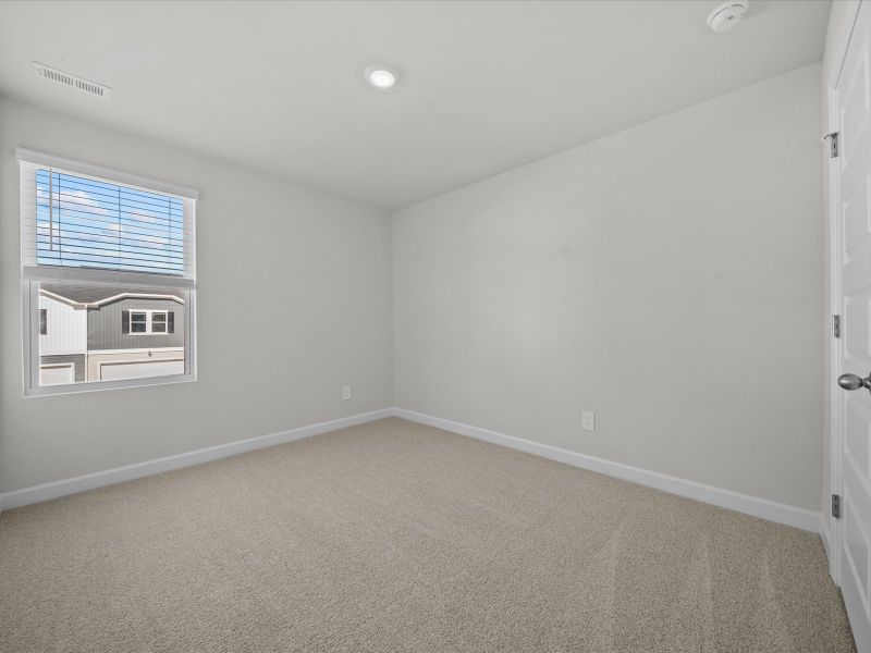 Spacious, unfurnished interior of a new home in Northbrook Village Townes, Taylors (Image 19).
