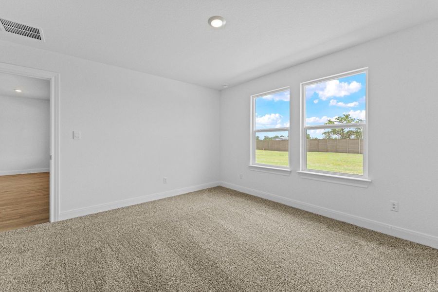 Spacious, unfurnished interior of a new home in Railhead, Cedar Creek (Image 29).