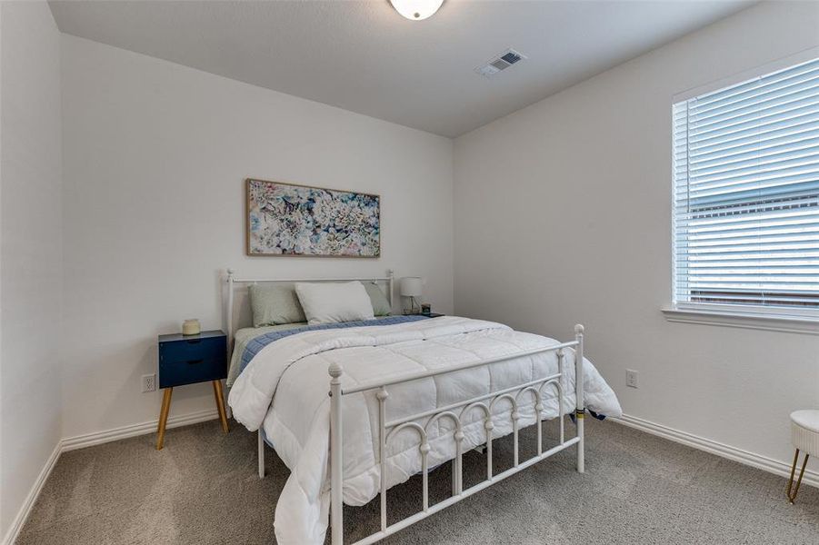 Furnished interior view inside a new home in Reunion 60s, Rhome (Image 13). Furnished interior view inside a new home in Reunion 60s, Rhome (Image 13).