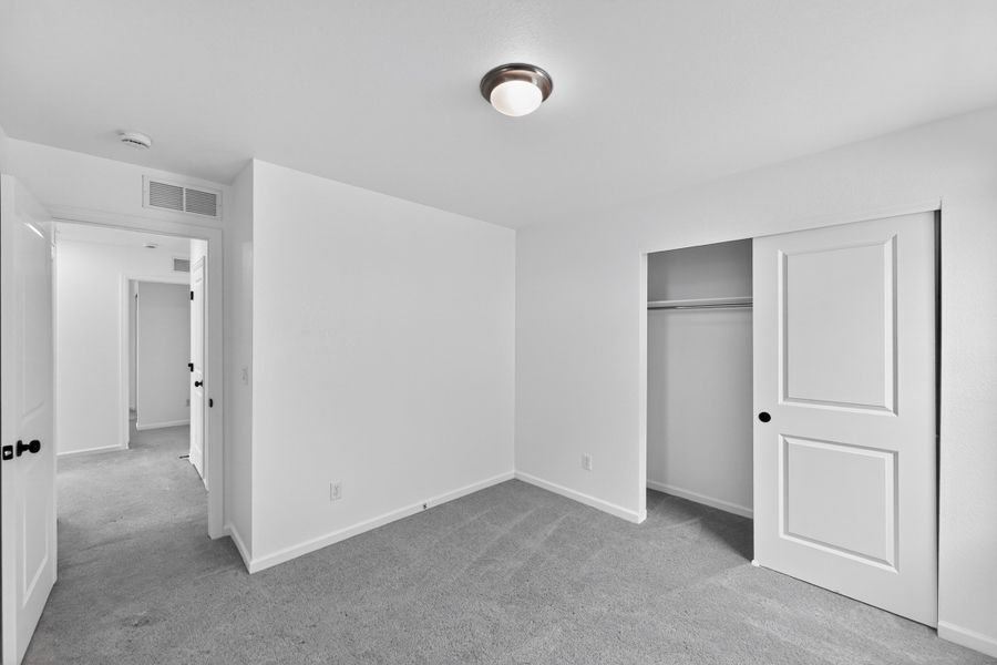 Spacious, unfurnished interior of a new home in Sky Ranch, Watkins (Image 30). Spacious, unfurnished interior of a new home in Sky Ranch, Watkins (Image 30).