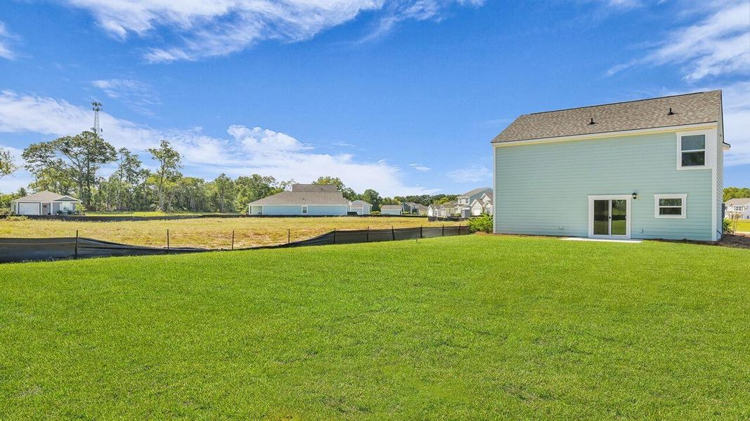 Exterior details and patio area of a home in Center Pointe, Santee (Image 17).